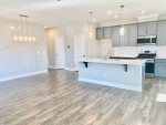 Nearly new, end-unit townhome in Briar Chapel. Natural light + views