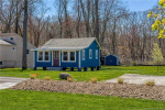 beautifully updated riverfront cottage with stunning views