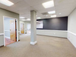 Sterling office with one of a kind windows and views of a pond
