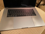 2016 MacBook Pro 15" w/TouchBar. Core i7, 16GB of RAM, 1TB SSD.