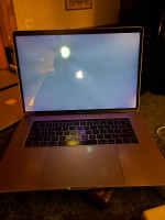 2016 MacBook Pro 15" w/TouchBar. Core i7, 16GB of RAM, 1TB SSD.
