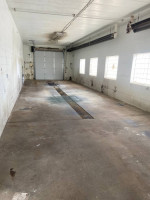 Approximately 1736 S/F Heated Shop Space with Drains For Lease