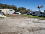 WAREHOUSE/SHOP, OFFICE, AND PARKING