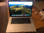 2018 Macbook Pro 15" with 32GB RAM, 512GB SSD, and i7 2.2GHz