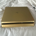 Original slim gold PS4 with 10 games included