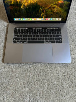 MacBook Pro 15” Touchbar running Sonoma