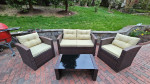 Outdoor Patio Furniture Set Brown with Table Tan Cushions and Storage.