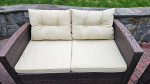 Outdoor Patio Furniture Set Brown with Table Tan Cushions and Storage.