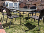Patio dining set - glass top table and six chairs