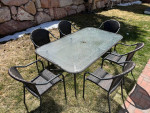 Patio dining set - glass top table and six chairs