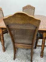 Kitchen Table 49” W  + 2- 10” Leafs, 4 Wicker Dining Chairs 20.5”