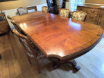 Carved wood formal dining table with  marquetry, double pedestal base