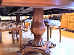 Carved wood formal dining table with  marquetry, double pedestal base