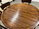 Round dining room table and 6 chairs