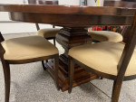 Round dining room table and 6 chairs
