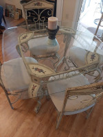 Absolutely awesome glass top dining table with 4 chairs!