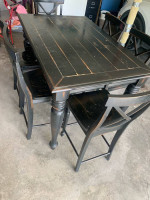 High top black rustic dining table with 6 chairs and a leaf
