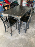 High top black rustic dining table with 6 chairs and a leaf