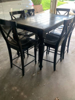 High top black rustic dining table with 6 chairs and a leaf