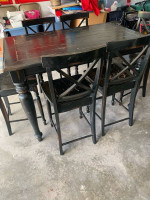 High top black rustic dining table with 6 chairs and a leaf