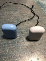 Wireless Bluetooth headphones - two complete sets with charging cases