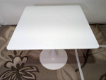 Brand new white square dining table, assembled from box