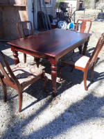 Very nice ornate 4 chair solid dark wood dining table