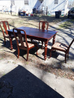 Very nice ornate 4 chair solid dark wood dining table
