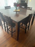 Dining room bar height table and 8 chairs