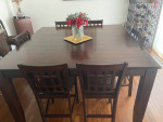 Dining room bar height table and 8 chairs