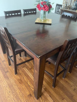 Dining room bar height table and 8 chairs