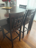 Dining room bar height table and 8 chairs