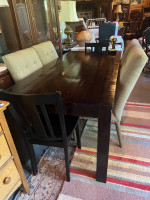 Beautiful pier one solid dining table and 6 chairs