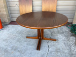 Mid Century Danish Teak Round Dining Table with 2 Leaves.by Karl Erik