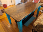 Farmhouse style table with bolted legs