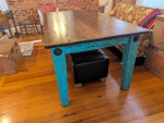 Farmhouse style table with bolted legs