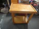 Butcher block table cutting shelf area