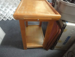 Butcher block table cutting shelf area