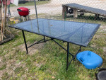 Glass top patio table