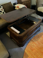 Coffee table with lift up top