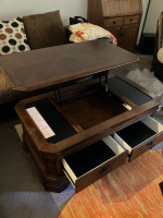 Coffee table with lift up top