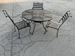 Beautiful wrought iron patio set table and 3 chairs LOWERED OBO