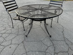 Beautiful wrought iron patio set table and 3 chairs LOWERED OBO