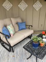 Patio glider seating and cocktail table