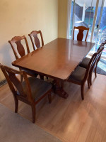 Cherry finished dining room table and 6 chairs