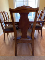 Cherry finished dining room table and 6 chairs