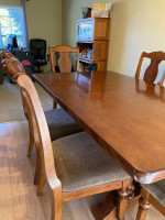 Cherry finished dining room table and 6 chairs