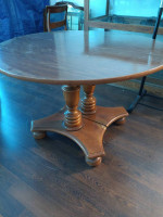 round table with solid wood base