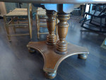 round table with solid wood base