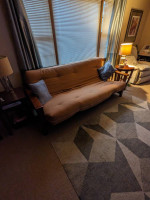 Fold out couch /bed with Futon and glass bamboo base table
